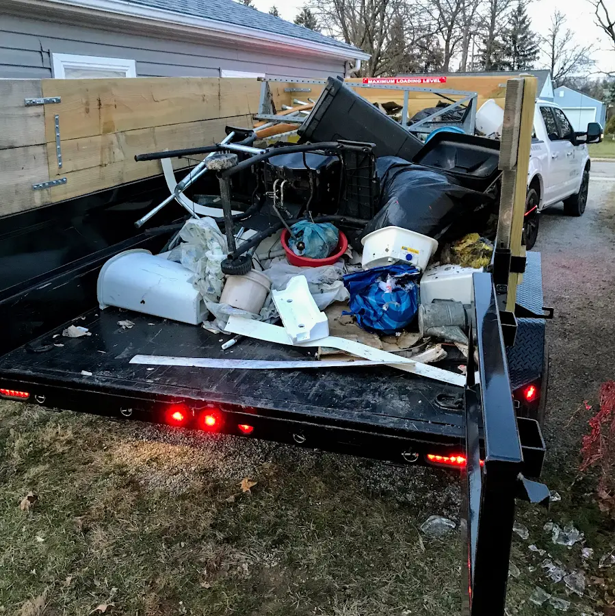Roll-off dumpster delivered to a residential driveway in La Joya